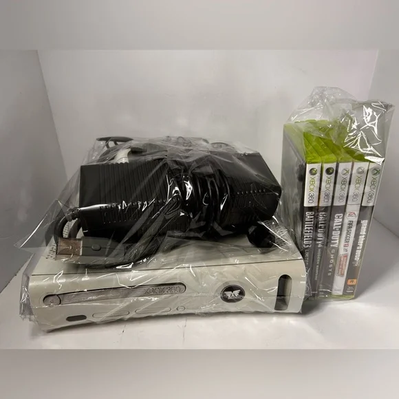 Microsoft Xbox Console with Controller and cords. 60GB. Some staining. Tested